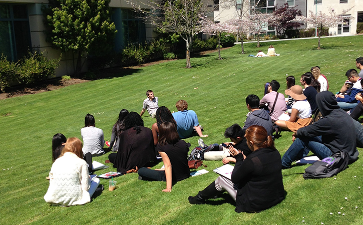 Class held outdoors on lawn.